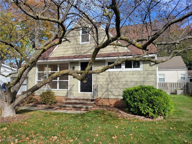 view of front of property with a front yard