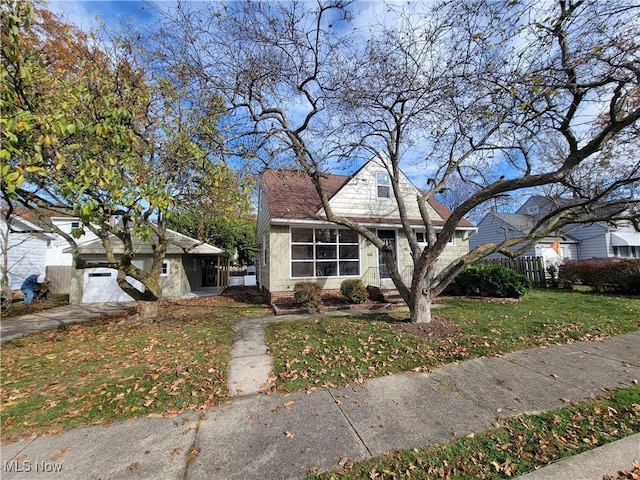 view of front of home with a front lawn