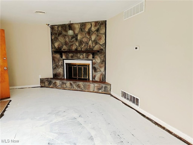 unfurnished living room featuring a fireplace