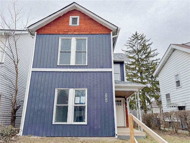 view of front of property with roof with shingles