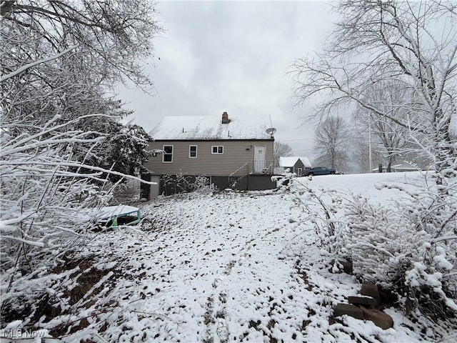 view of snow covered property