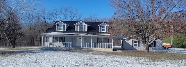 cape cod house with a porch