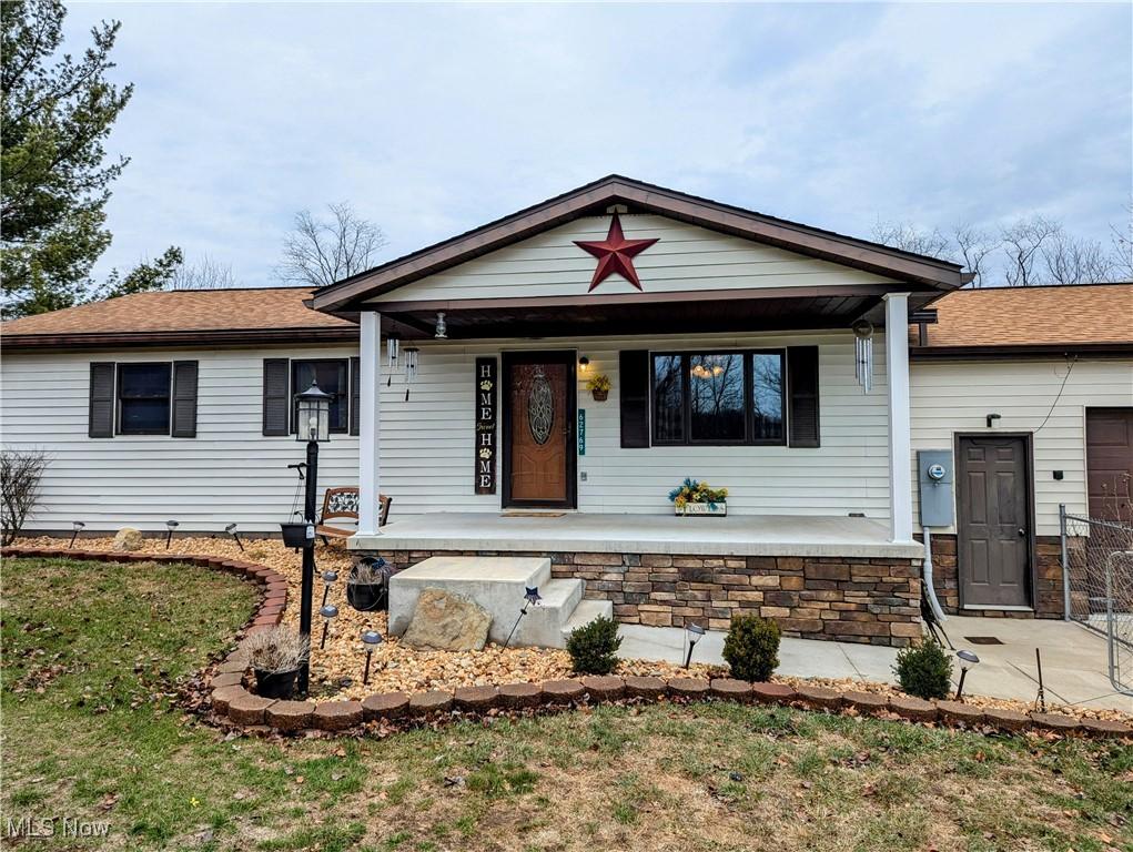 62769 Riggs Rd, Bellaire, OH 43906 - view of front of house with covered porch