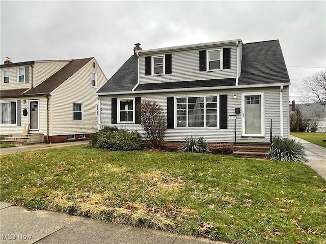 view of front of home with a front yard