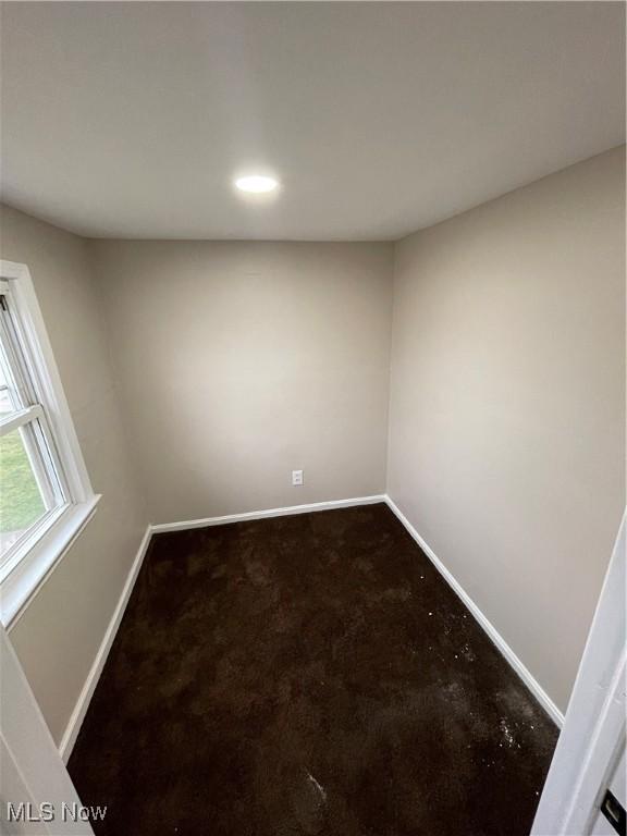 empty room featuring carpet flooring