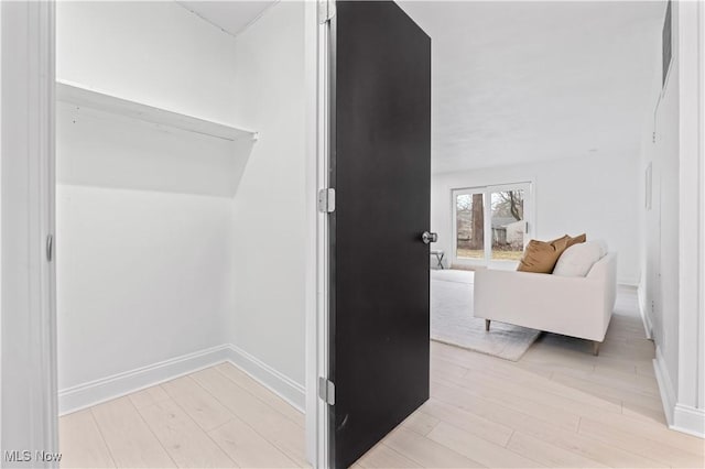 hall featuring light hardwood / wood-style floors