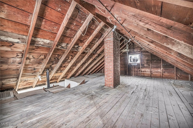 view of unfinished attic