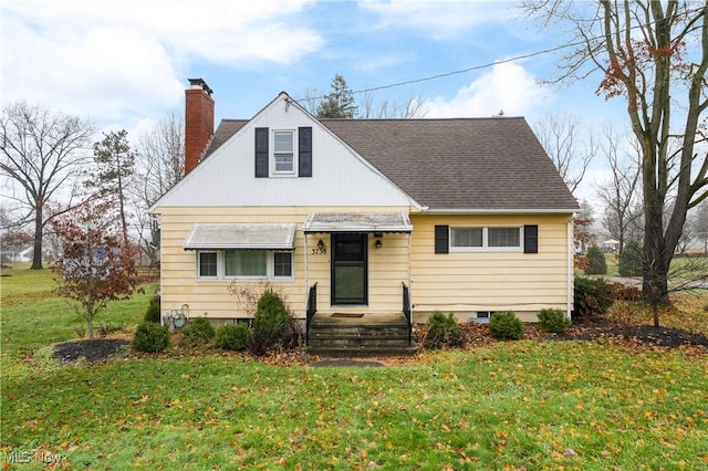 view of front facade with a front yard