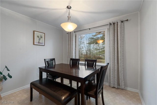 dining room with ornamental molding