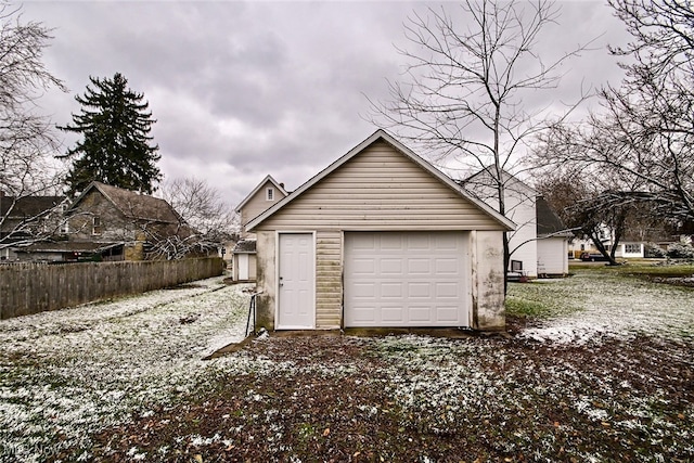 view of snow covered garage