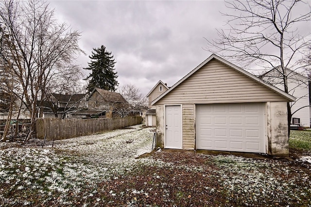 view of snow covered garage