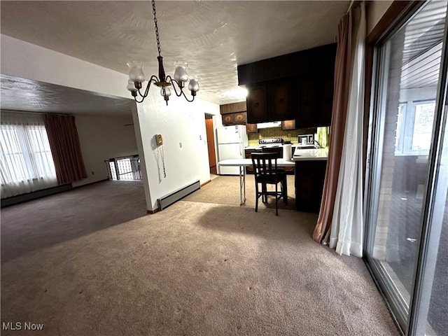 dining space featuring light carpet, a baseboard radiator, and a notable chandelier