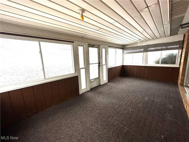 unfurnished sunroom featuring a healthy amount of sunlight