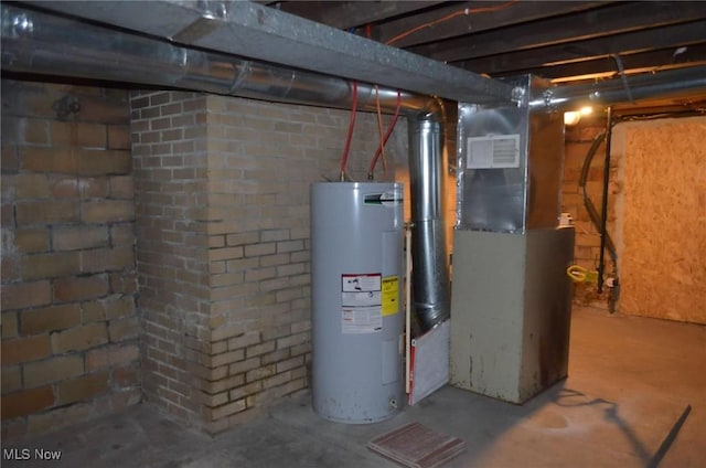 utility room with heating unit and water heater