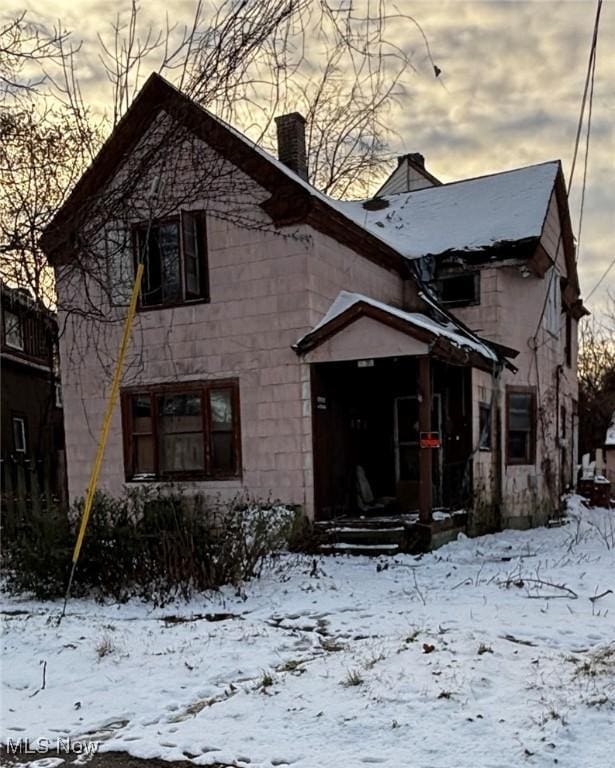 view of snow covered property