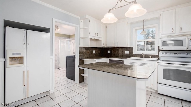 kitchen featuring white appliances, pendant lighting, a center island, white cabinetry, and light tile patterned flooring