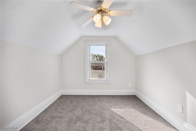 bonus room featuring ceiling fan, carpet floors, and vaulted ceiling