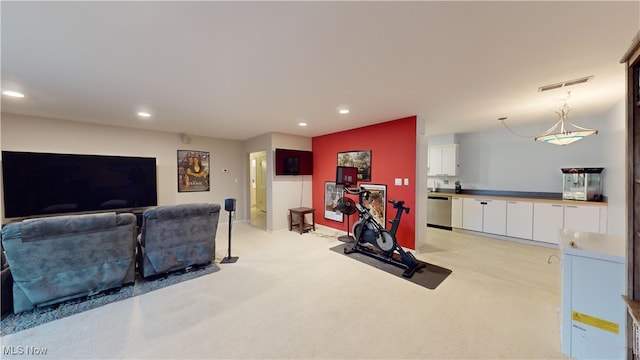 workout area with light colored carpet