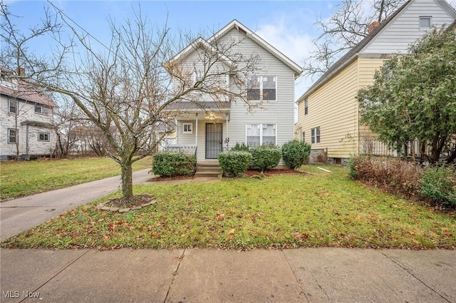 view of front facade featuring a front yard