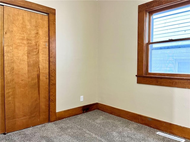 view of carpeted spare room