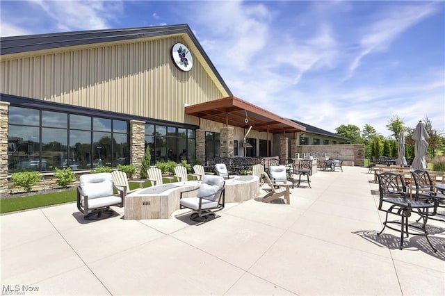 view of patio featuring a fire pit