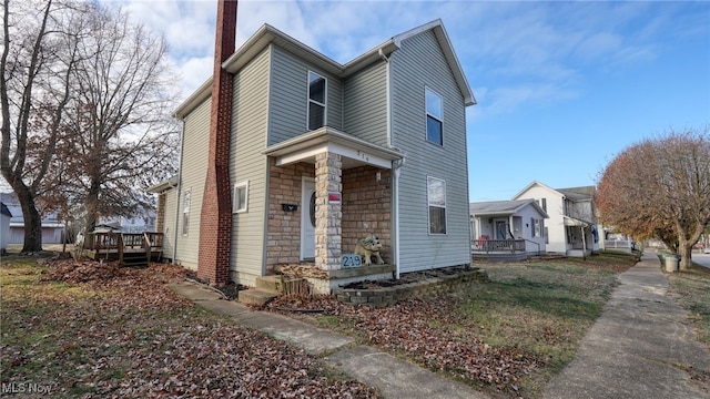 view of front of home featuring a wooden deck