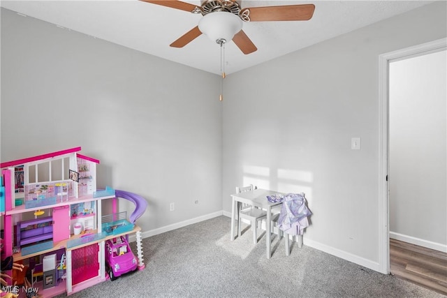 game room featuring ceiling fan and hardwood / wood-style flooring