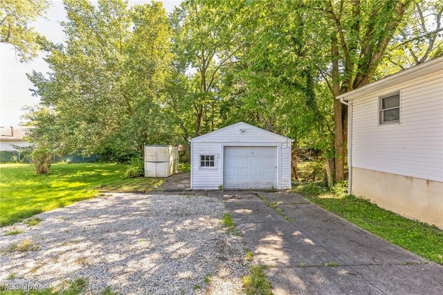 garage with a lawn