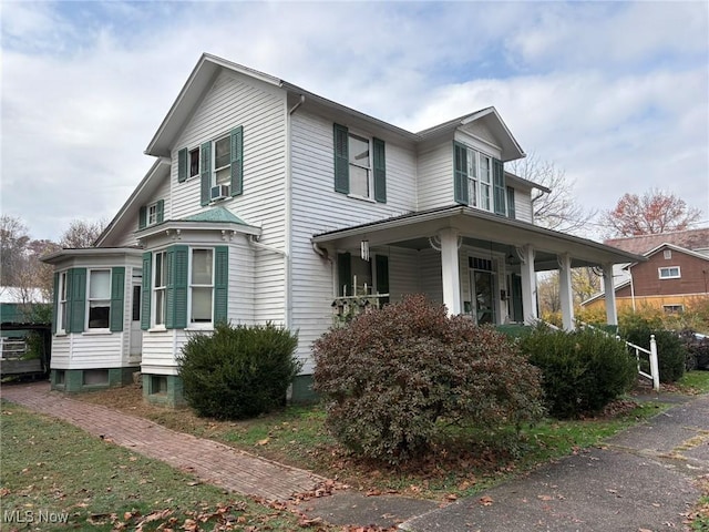 view of home's exterior featuring covered porch