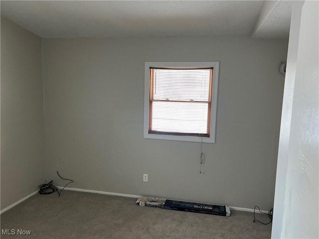 spare room with carpet flooring