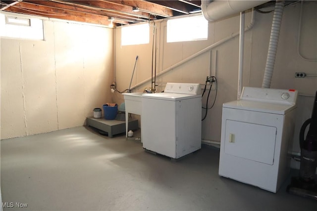 laundry room featuring washer and clothes dryer