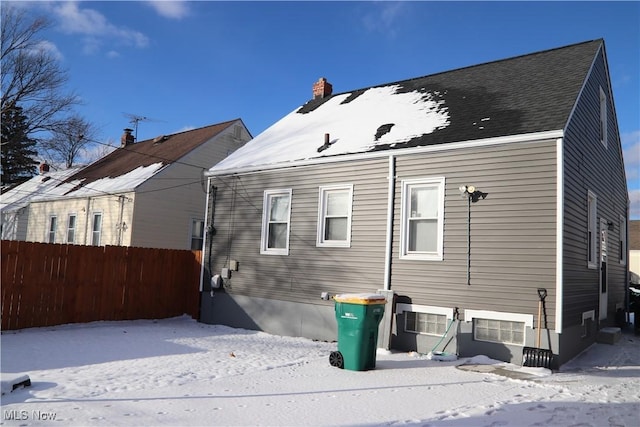 view of snow covered house