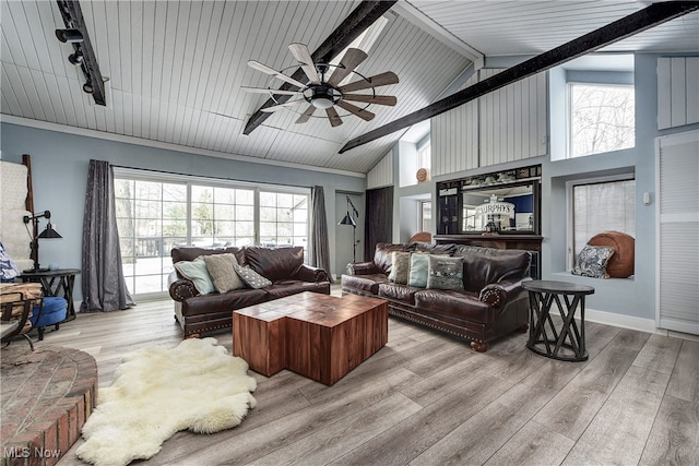 living room featuring plenty of natural light and light wood-type flooring