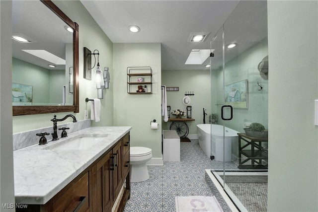 full bathroom with tile patterned floors, vanity, toilet, and shower with separate bathtub