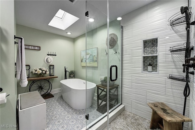 bathroom featuring tile patterned flooring, a skylight, and independent shower and bath