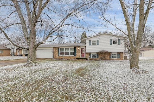 split level home featuring a garage