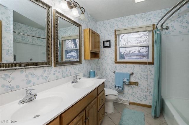 full bathroom featuring toilet, tile patterned flooring, shower / tub combo, and vanity