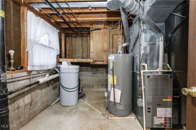 utility room with heating unit and gas water heater