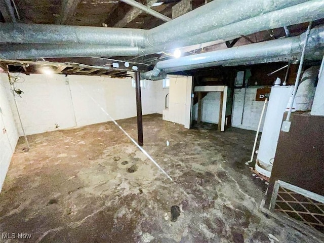 basement featuring gas water heater