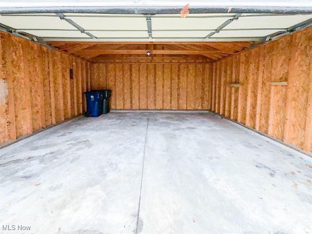 garage with wood walls