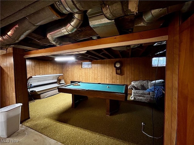 game room featuring wooden walls, concrete flooring, and pool table