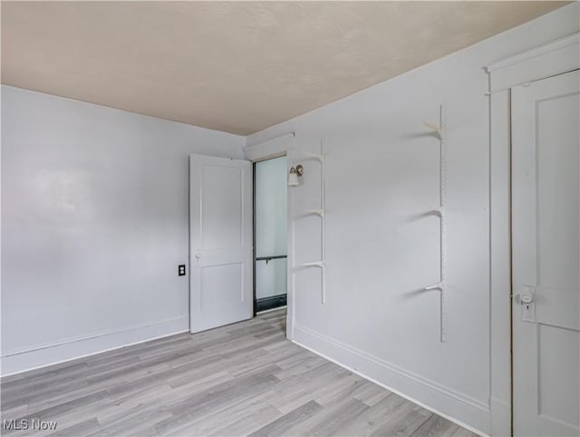 empty room featuring light hardwood / wood-style flooring