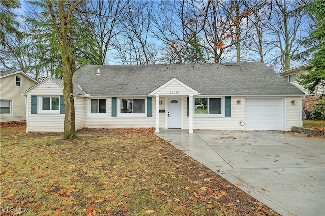 ranch-style house featuring a garage