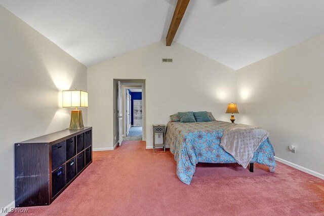 bedroom with carpet flooring and vaulted ceiling with beams