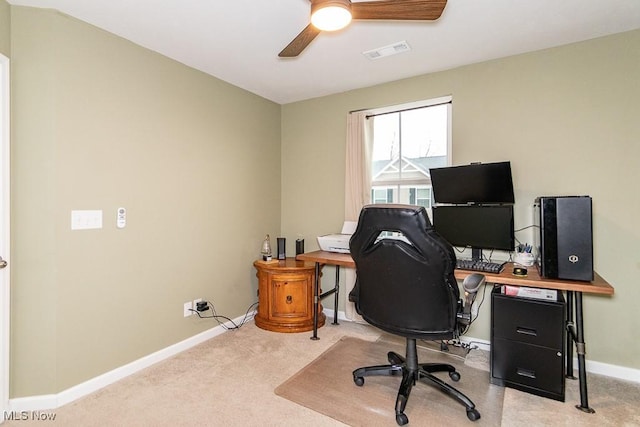 office featuring light carpet and ceiling fan