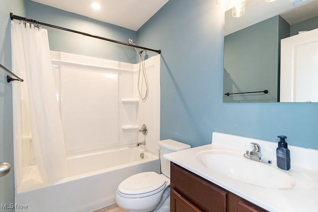 full bathroom featuring vanity, toilet, and shower / bath combo with shower curtain