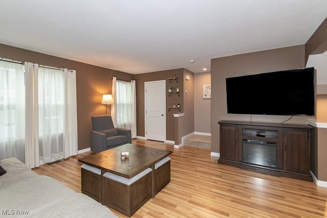 living room with light hardwood / wood-style floors