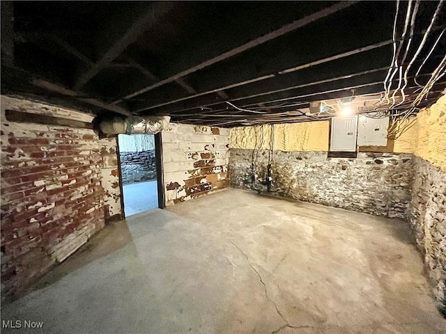 basement with electric panel