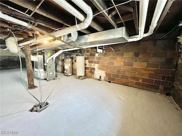 basement with heating unit and water heater