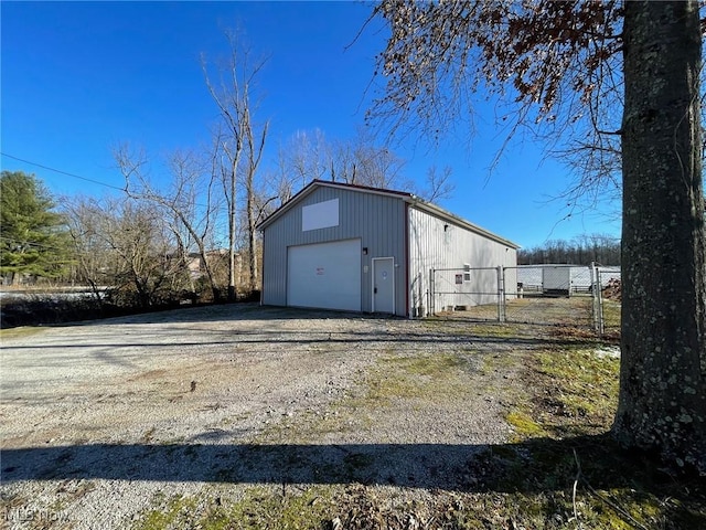 view of outbuilding with a garage